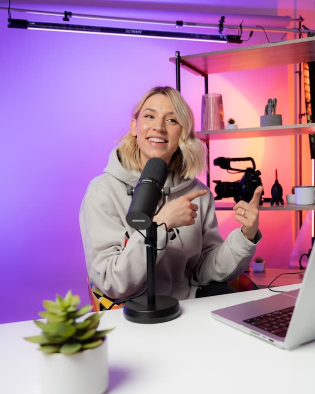 A creator recording content in a home studio